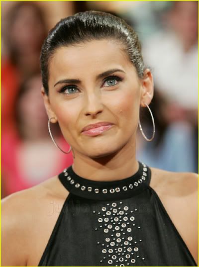 Why Nelly Furtado always looks like she just tried to sneak one by 