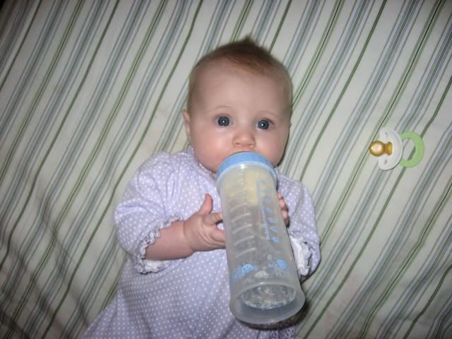 Whose baby is holding their own bottle? BabyCenter
